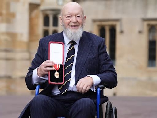 Glastonbury founder Michael Eavis, 88, is knighted by Princess Anne for services to music and charity after attending Windsor Castle in his wheelchair