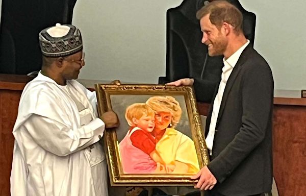 Prince Harry Gifted Special Paintings Honoring Princess Diana and His Wedding Day on Solo Outing in Nigeria