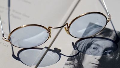 Blue-tinted glasses given by John Lennon to be auctioned with Abbey Road photos
