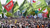 Workers and activists across Asia and Europe hold May Day rallies to call for greater labor rights