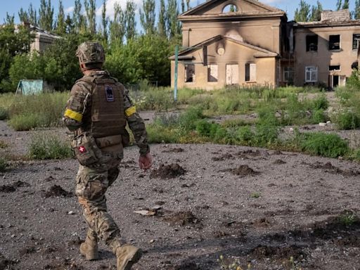 Ukraine’s Army retreats from positions as Russia marches into strategically vital town