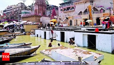 Ganga ghat water level rise disrupts cremations in Varanasi | Varanasi News - Times of India