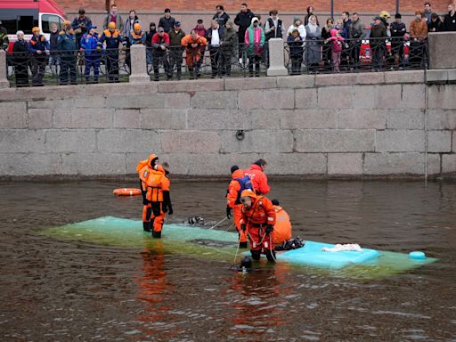 A bus plunges off a bridge in the Russian city of St. Petersburg, killing 3 and injuring 6 others