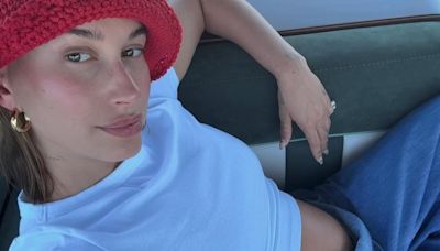 Hailey Bieber flaunts baby bump in 'summer so far' slideshow