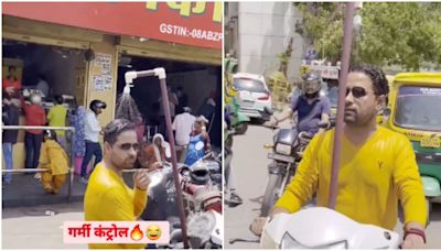 Jodhpur man’s viral jugaad as he installs makeshift shower on scooter amid heatwave