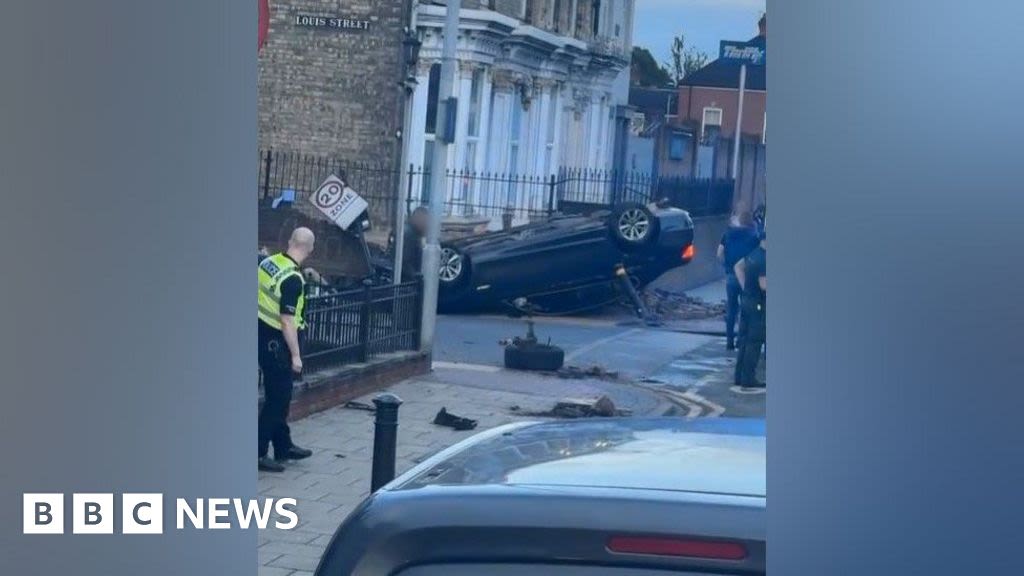 Car hits two men before landing on roof in Hull's Spring Bank