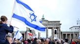 Watch as hundreds gather in Berlin for Israel solidarity demo at Brandenburg Gate