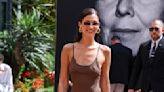 Bella Hadid Makes Cannes Arrival in Brown Corset-stitched Minidress and a Pop of Pink Prada for 2024 Film Festival