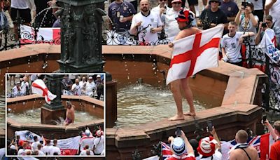 England fans bare all and jump in fountain before Denmark clash