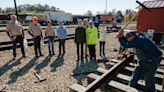 A taste of railroading: Scouts sample train life at Age of Steam Roundhouse