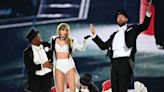 Travis Kelce Makes Surprise ‘Eras Tour’ Appearance Onstage, Revives Taylor Swift After Heartbreak | Video