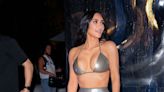 Kim Kardashian Rocks the Belly Chain Trend With Her Black Triangle Bikini