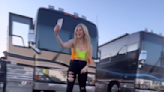 Avril Lavigne serves full-on punk in neon green crop top in skateboarding videos