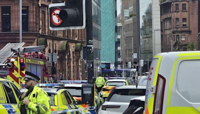 Police lock down busy street in major response as woman hit by car in city centre