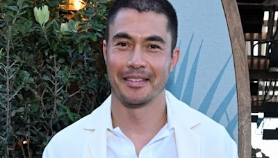 Henry Golding Says ‘A Simple Favor 2’ Is ‘Much More Bananas,’ Explains Cutting Off His Hair After ‘Nine...