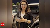 Airport spotting: Madhuri Dixit opts for boss lady look | Hindi Movie News - Times of India