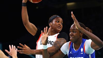 Basketball-Canada men's team in the stands to support women's side in shock defeat