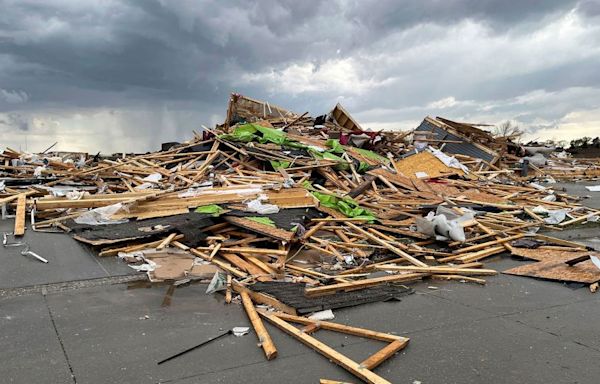 Devastating tornadoes rip through Nebraska and Iowa, sending crews searching flattened homes as storm threat continues