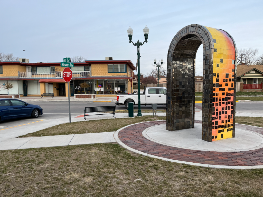 Photo album-inspired arch in Garden City reflects an artist’s gratitude and community’s history