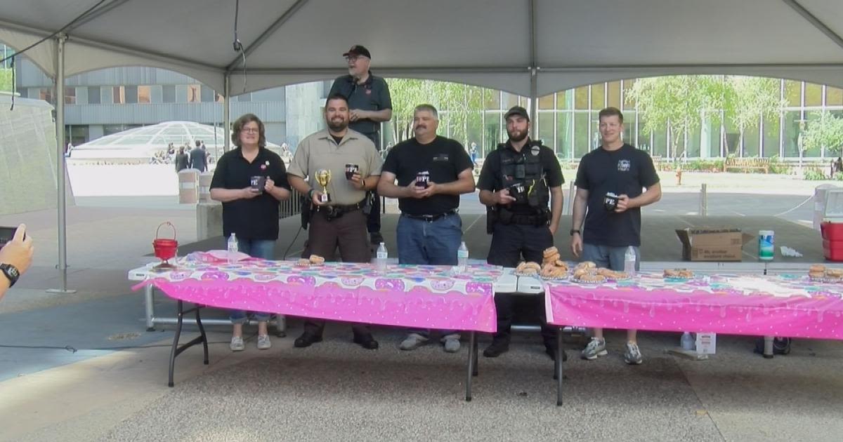 Downing some donuts to benefit the Rochester Salvation Army