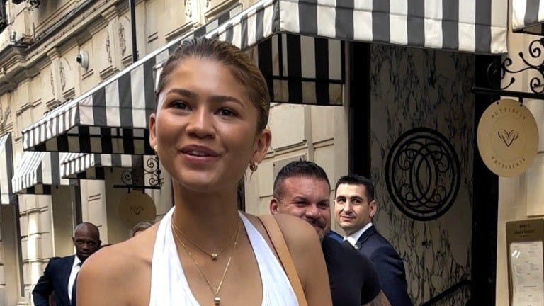 Zendaya Nails Parisian Cool in a Halter Top and Asymmetrical Maxi Skirt