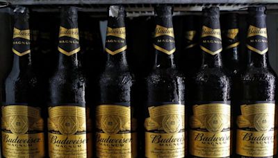 Brewer AB InBev beats Q2 profit forecast, but volumes slip