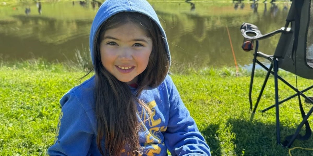 9-year-old girl reels in golden trout at annual fishing event in Woodbury