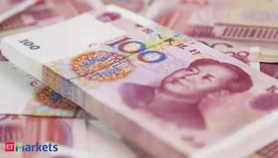 China's yuan slumps to seven-month low on weaker guidance