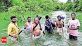 Health officer treks 16km to deliver meds & provisions to 11 tribal families | Hyderabad News - Times of India