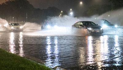 Dam fails in Illinois as US states hit by heavy rain and tornadoes