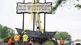 Wagons ho! Westport’s dilapidated Conestoga lifted away, replaced with ‘new’ version