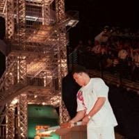 Boxing superstar Muhammad Ali overcomes his trembling from Parkinson's disease to light the Olympic flame in Atlanta