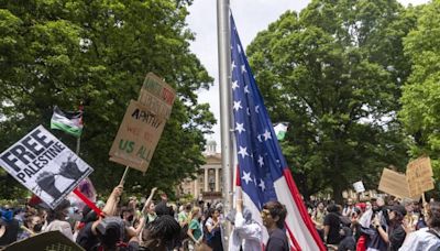 Trump posts campaign ad praising UNC students holding up US flag during campus protest