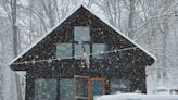 A woman and her husband transformed her parent's cabin into a solar-powered off-grid home in Kentucky complete with a 50-yard zip line — take a look