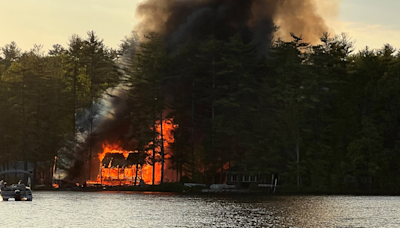 Crews battle fire on shore of Little Sebago Lake in Raymond