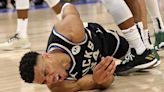 Giannis Antetokounmpo injured as Bucks lose Game 1 to Heat; Tyler Herro breaks hand