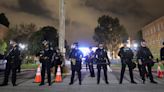 Violence flares at UCLA as police end protests at New York's Columbia