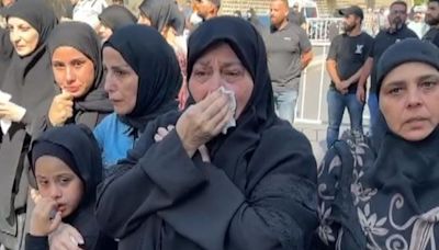 Hundreds mourn children killed in Beirut blast as border violence threatens to spiral