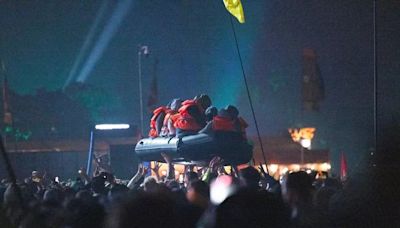 Banksy confirms Glastonbury Festival inflatable 'migrant' boat was his work