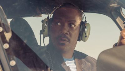 Why the 'Beverly Hills Cop" director chose to film an actual car falling off a building over using CGI: 'The stakes are real, and the danger is real.'