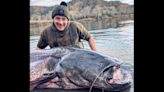 Despite freezing, angler lands 222-pound catfish after a half-mile tow