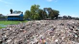 They study next to one of Africa's largest trash dumps. They're planting bamboo to try to cope