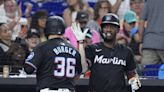 Jake Burger homers and doubles in the Marlins' 6-4 victory over the Mets