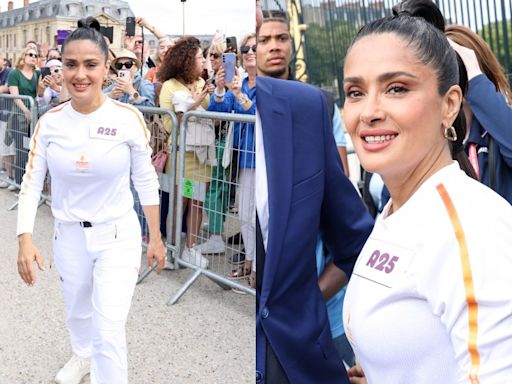 Salma Hayek Gets Fired Up for Paris Olympics Torch Relay in Tracksuit Uniform in Versailles