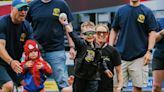 Fallen state trooper's son throws out first pitch at Yard Goats game