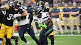 Former Spartan, Seahawks RB Kenneth Walker misses practice, dealing with ‘little hernia thing’