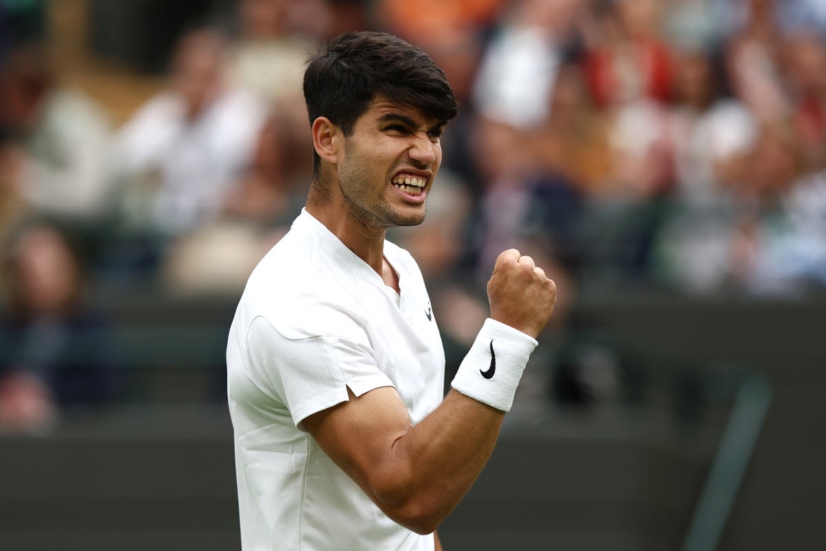 Wimbledon: Carlos Alcaraz cruises past Aleksandar Vukic in second round to keep title defence on track at SW19