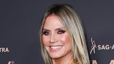 Heidi Klum flashes major sideboob in sparkling minidress at Emmys bash