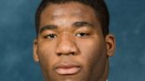 Obi Ezeh, a former Michigan football and GR Catholic Central standout LB, dies at 36