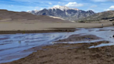 Medano Creek begins flowing at Great Sand Dunes National Park in Colorado